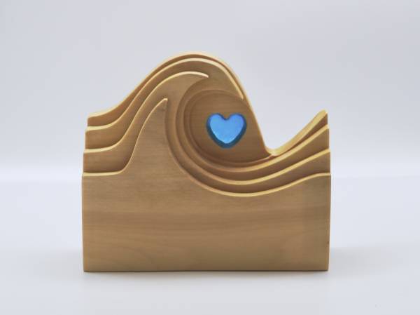 - a , wood Sculpture by Mark Richards, measuring 12 x 18 cm (H x W) £95